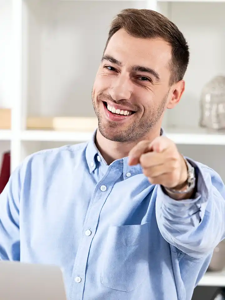 Cheerful businessman after seeing website results