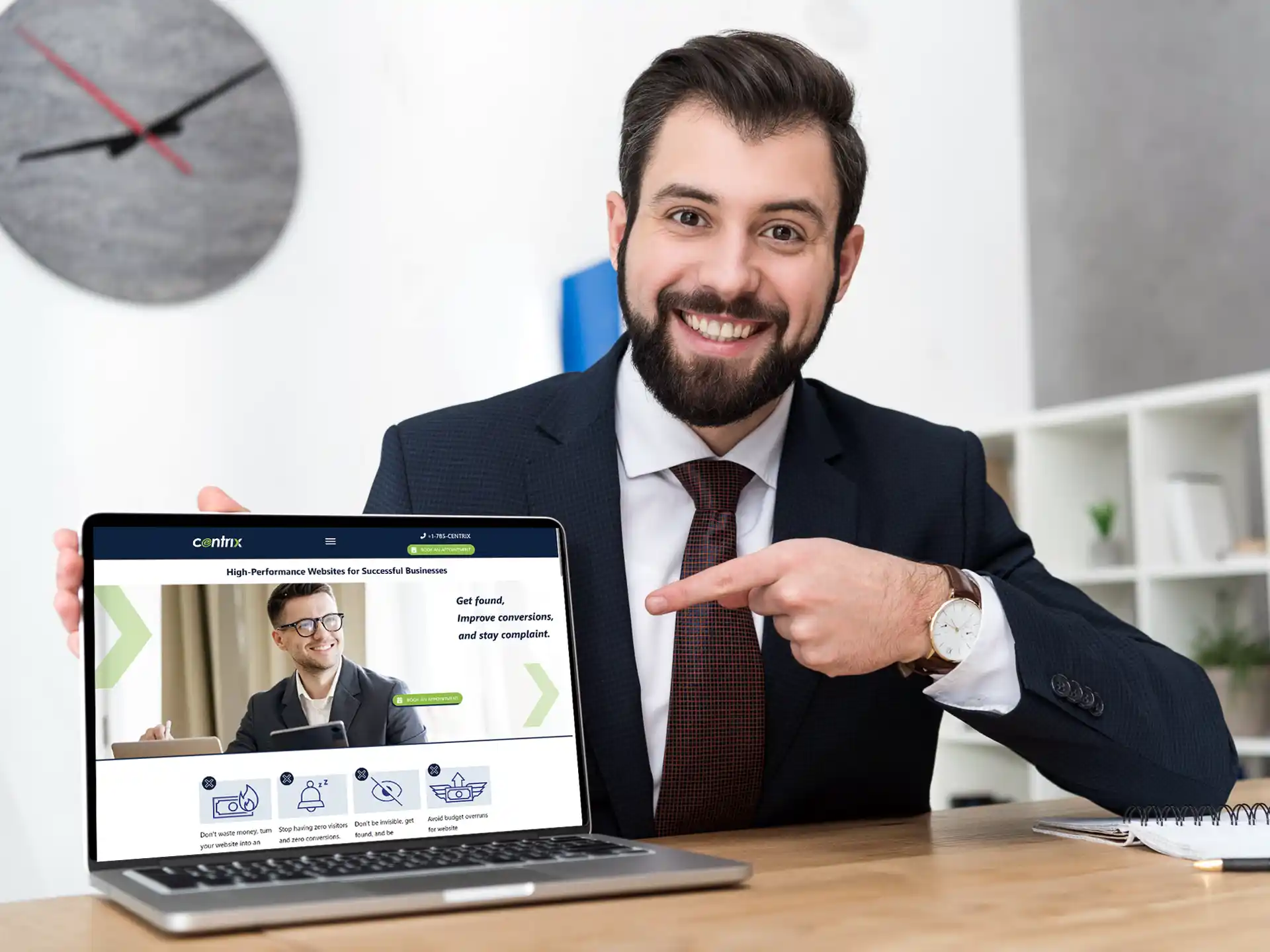 Cheerful businessman pointing at Centrix website